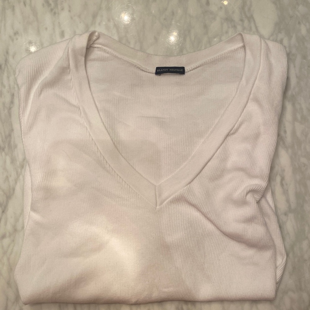 Brandy Melville white v neck long sleeve in color white!! Great condition